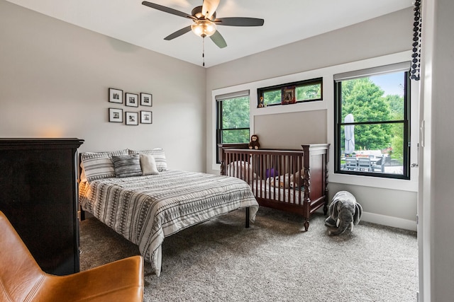 4203 Curtis Meadow Dr, Champaign, IL 61822 - carpeted bedroom with ceiling fan and baseboards