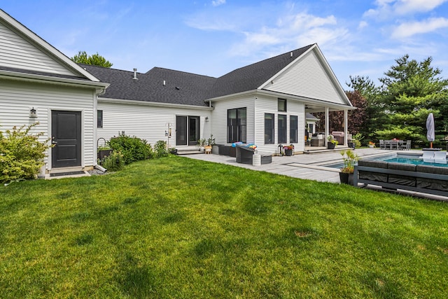 4203 Curtis Meadow Dr, Champaign, IL 61822 - back of house featuring an outdoor living space, a yard, an outdoor pool, and a patio