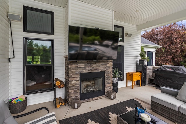 4203 Curtis Meadow Dr, Champaign, IL 61822 - view of patio / terrace featuring an outdoor living space with a fireplace and grilling area