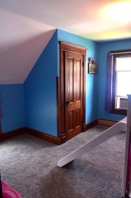 1207 4th Ave, Sterling, IL 61081 - bonus room featuring carpet, cooling unit, baseboards, a baseboard radiator, and vaulted ceiling