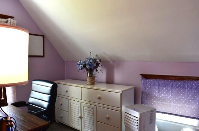 1207 4th Ave, Sterling, IL 61081 - office featuring lofted ceiling and carpet flooring