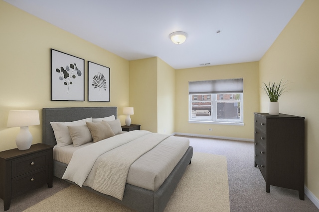 965 Rogers St Unit 208, Downers Grove, IL 60515 - bedroom featuring light colored carpet and baseboards