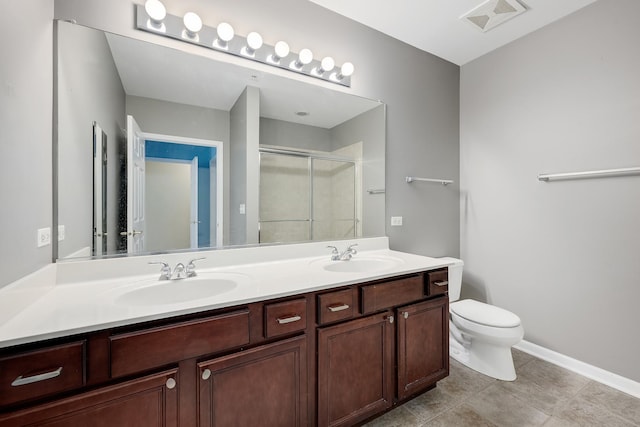 965 Rogers St Unit 208, Downers Grove, IL 60515 - bathroom with double vanity, a stall shower, and tile patterned flooring