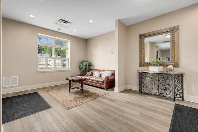 965 Rogers St Unit 208, Downers Grove, IL 60515 - living area featuring wood finished floors and recessed lighting