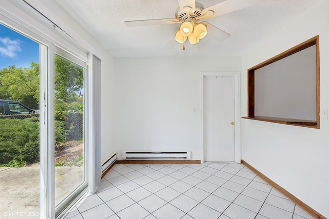 325 Larkdale Row, Wauconda, IL 60084 - spare room with a baseboard radiator, light tile patterned flooring, a ceiling fan, and a textured ceiling