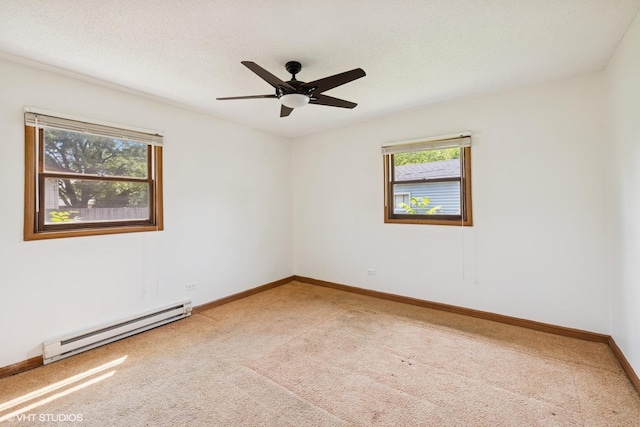 325 Larkdale Row, Wauconda, IL 60084 - spare room with baseboard heating, carpet floors, and ceiling fan