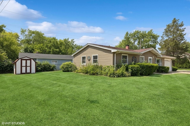 325 Larkdale Row, Wauconda, IL 60084 - view of home's exterior with a chimney, a shed, a lawn, and an attached garage