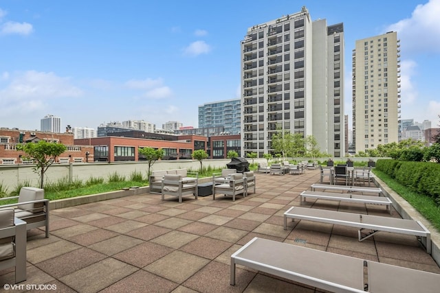 230 W Division St Unit 1208, Chicago, IL 60610 - view of patio with an outdoor living space and a view of city