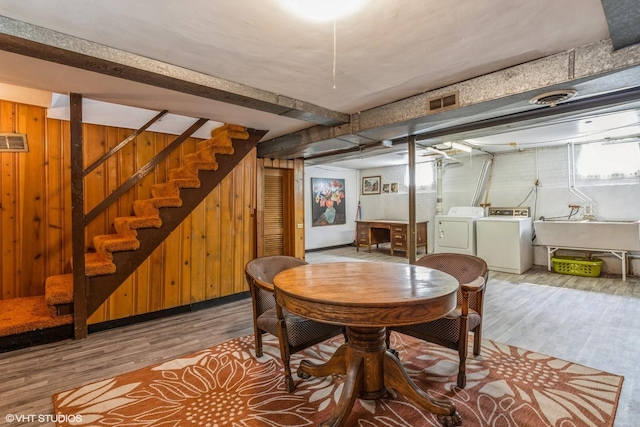 239 Imperial St, Park Ridge, IL 60068 - dining room with wood finished floors, wood walls, stairs, independent washer and dryer, and beam ceiling
