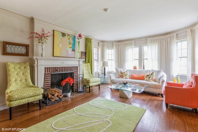 239 Imperial St, Park Ridge, IL 60068 - living room featuring plenty of natural light, crown molding, hardwood / wood-style floors, and a fireplace