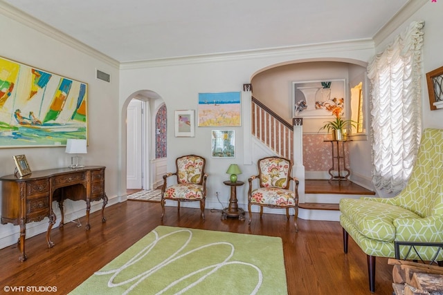 239 Imperial St, Park Ridge, IL 60068 - sitting room with wood finished floors, arched walkways, crown molding, stairway, and baseboards