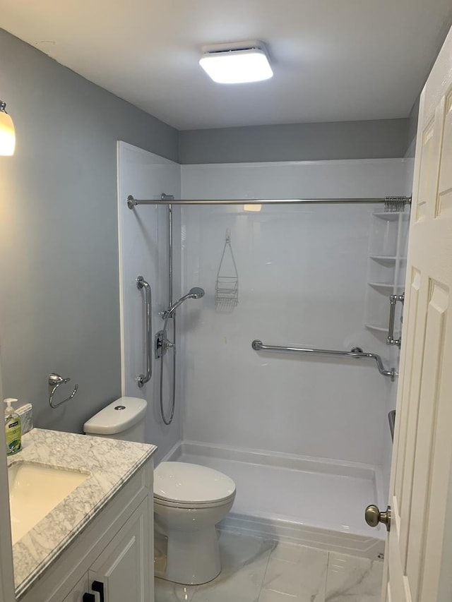245 Park Ln Unit 208, Palatine, IL 60074 - bathroom featuring a shower, marble look tile flooring, vanity, and toilet
