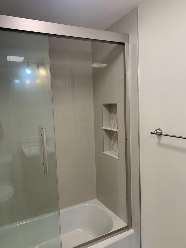 245 Park Ln Unit 208, Palatine, IL 60074 - full bathroom featuring shower / bath combination with glass door
