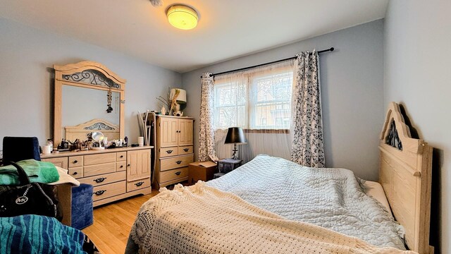 3161 Paris Ave N Unit 104, River Grove, IL 60171 - bedroom with light wood-style flooring
