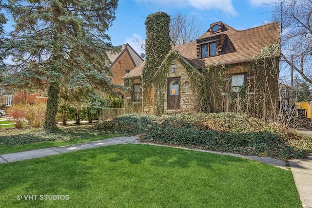 562 Byrd Rd, Riverside, IL 60546 - english style home featuring a front lawn and stone siding