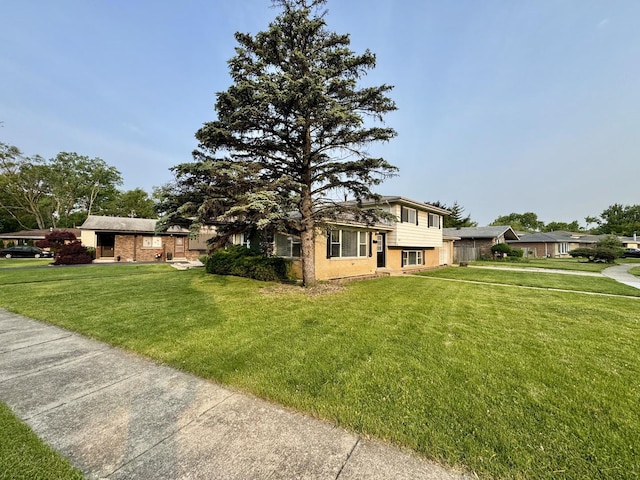 4230 Barry Ln, Oak Forest, IL 60452 - split level home with a front lawn and brick siding