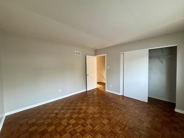 4230 Barry Ln, Oak Forest, IL 60452 - unfurnished bedroom with baseboards and a closet