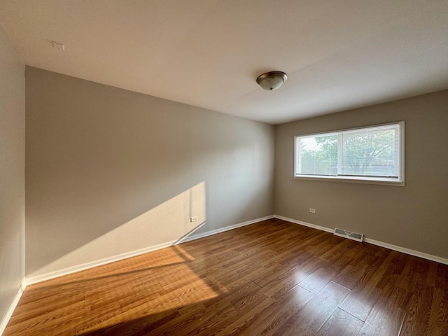 4230 Barry Ln, Oak Forest, IL 60452 - empty room with wood finished floors and baseboards