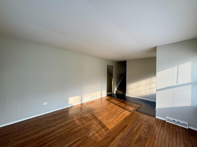 4230 Barry Ln, Oak Forest, IL 60452 - empty room with hardwood / wood-style flooring, stairs, and baseboards