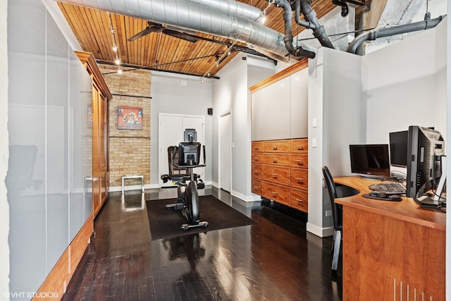 411 W Ontario St Unit 201-302, Chicago, IL 60654 - workout room with a towering ceiling, dark wood-type flooring, baseboards, and wooden ceiling