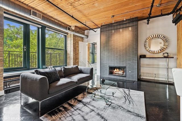 411 W Ontario St Unit 201-302, Chicago, IL 60654 - living area with a fireplace and wooden ceiling