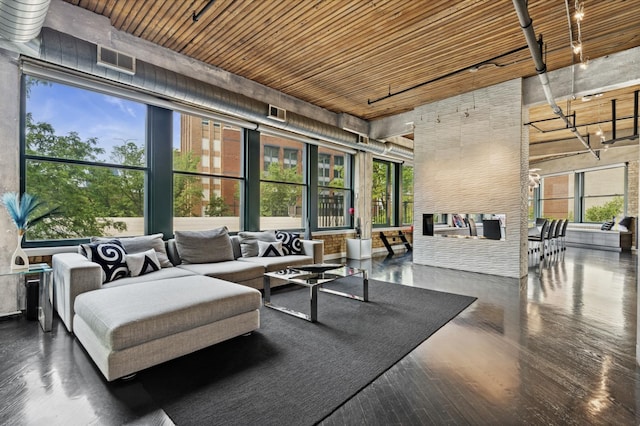 411 W Ontario St Unit 201-302, Chicago, IL 60654 - living area featuring wooden ceiling, a towering ceiling, and wood finished floors