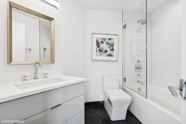 411 W Ontario St Unit 201-302, Chicago, IL 60654 - bathroom with tile patterned floors, toilet, vanity, and  shower combination