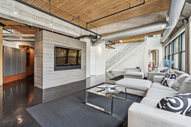 411 W Ontario St Unit 201-302, Chicago, IL 60654 - living room featuring stairway, baseboards, and wood finished floors