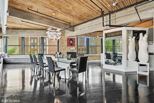 411 W Ontario St Unit 201-302, Chicago, IL 60654 - dining area with plenty of natural light, a chandelier, and wooden ceiling