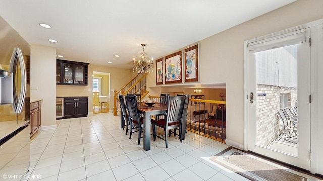 2443 Maple St, River Grove, IL 60171 - dining area with stairs, a chandelier, light tile patterned floors, wine cooler, and recessed lighting