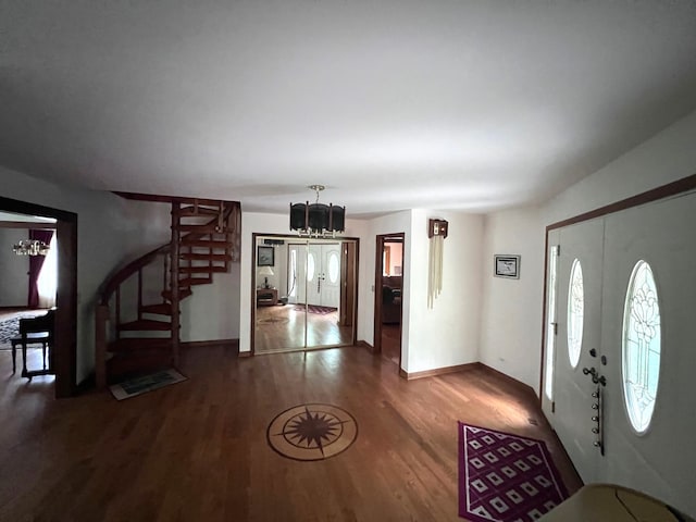 38W361 Binnie Rd, Dundee, IL 60118 - entryway featuring a chandelier, stairway, wood finished floors, and baseboards