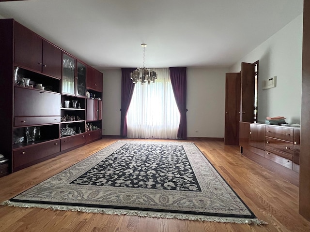38W361 Binnie Rd, Dundee, IL 60118 - dining space featuring a chandelier and light wood-style floors