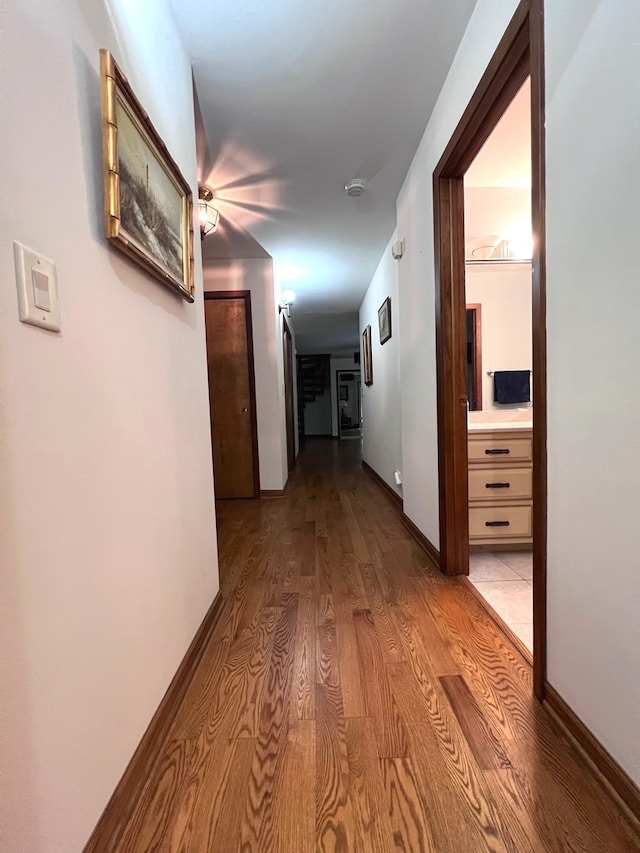 38W361 Binnie Rd, Dundee, IL 60118 - hallway featuring light wood-type flooring and baseboards
