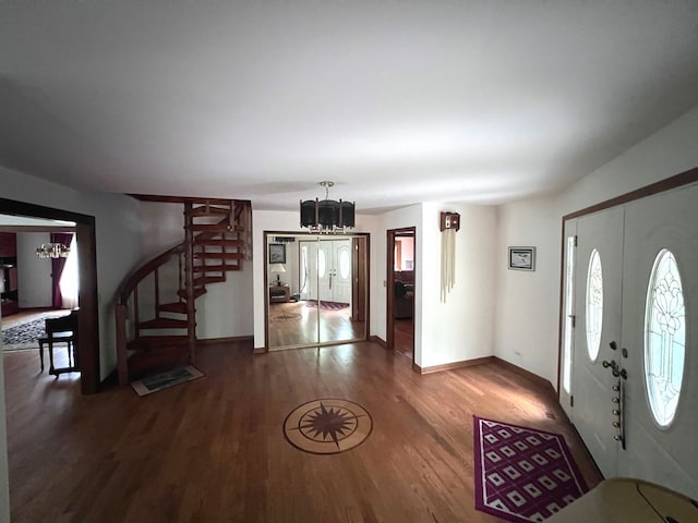 38W361 Binnie Rd, Dundee, IL 60118 - foyer entrance featuring a chandelier, stairs, wood finished floors, and baseboards