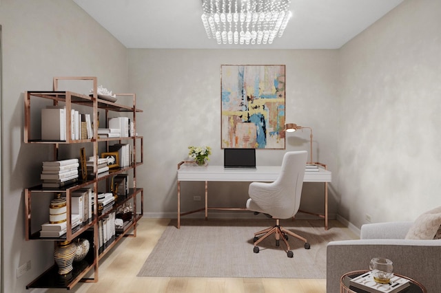 740 S Federal St Unit 301, Chicago, IL 60605 - home office featuring wood finished floors, a chandelier, and baseboards
