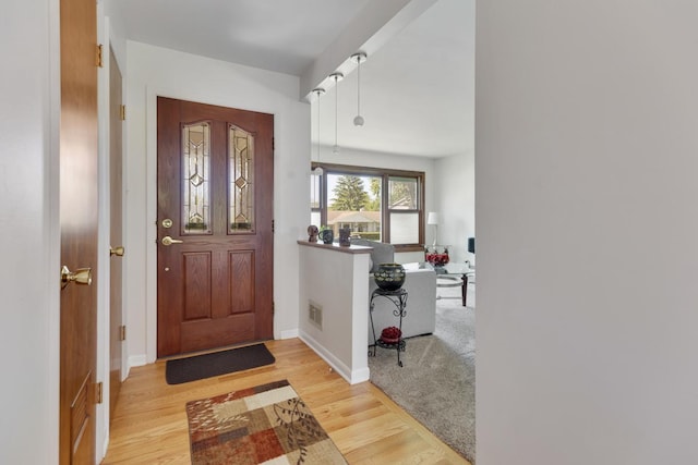 298 Fern Dr, Elk Grove Village, IL 60007 - entryway with light wood-style floors and baseboards