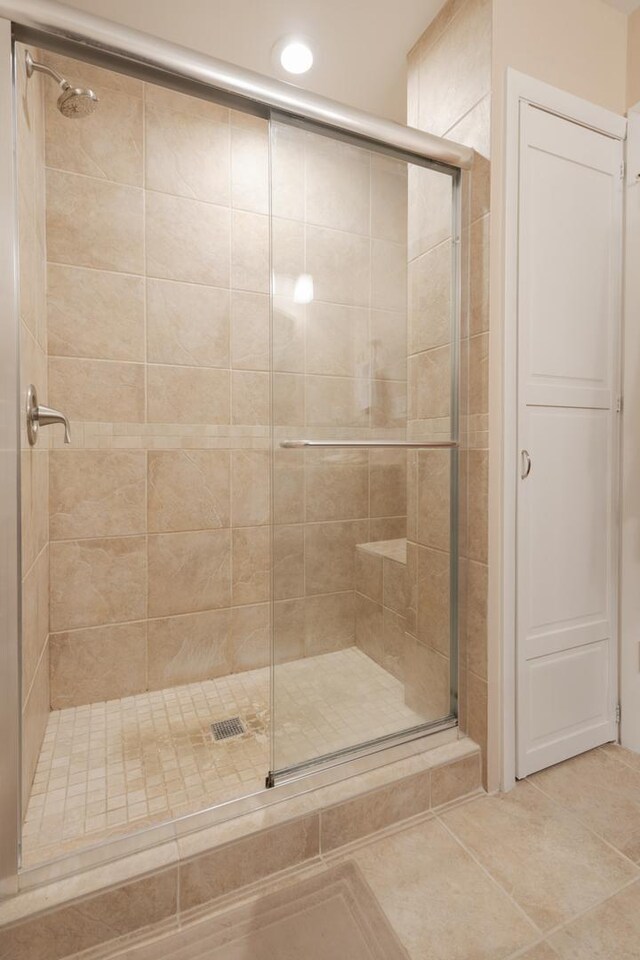298 Fern Dr, Elk Grove Village, IL 60007 - full bathroom featuring a stall shower and tile patterned flooring