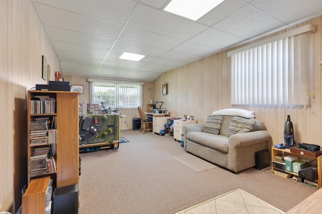 298 Fern Dr, Elk Grove Village, IL 60007 - carpeted living room with wooden walls and a paneled ceiling