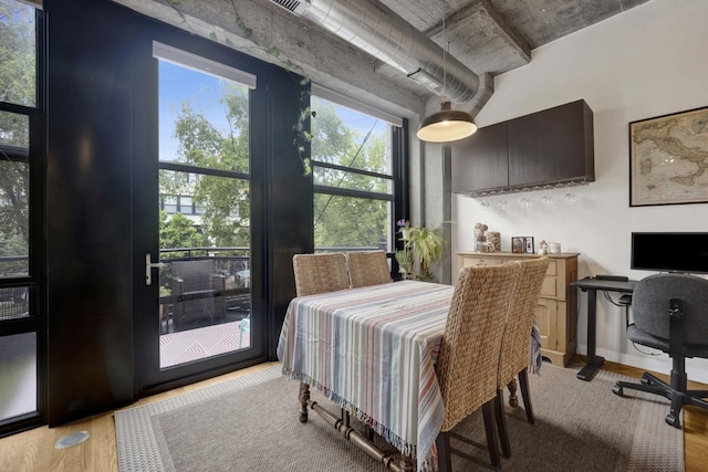 1110 W 15th St Unit 228, Chicago, IL 60608 - bedroom featuring light wood finished floors, an office area, and access to outside