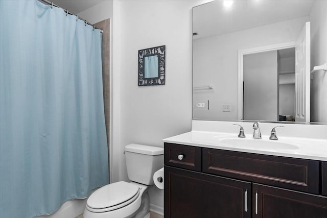 2140 Washington Dr, Northbrook, IL 60062 - bathroom featuring vanity, toilet, and curtained shower