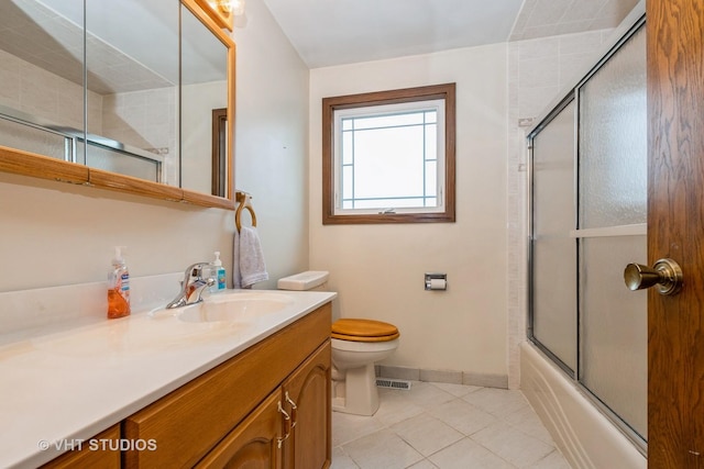 9335 Odell Ave, Bridgeview, IL 60455 - bathroom with vanity, tile patterned flooring, and shower / bath combination with glass door