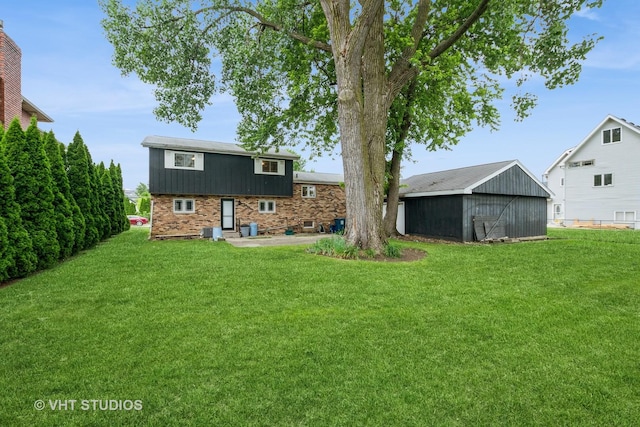 9335 Odell Ave, Bridgeview, IL 60455 - rear view of property featuring a yard and brick siding