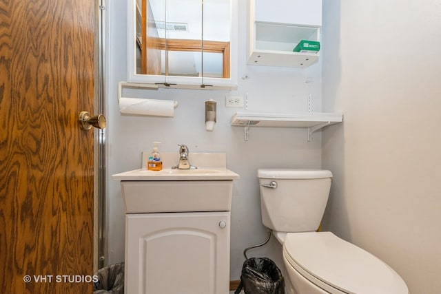 9335 Odell Ave, Bridgeview, IL 60455 - half bathroom featuring toilet and vanity