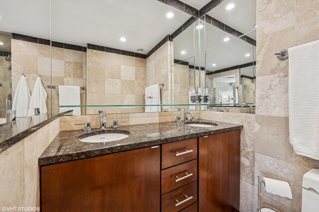 30 E Huron St Unit 3109, Chicago, IL 60611 - full bath featuring tile walls, double vanity, toilet, and a tile shower