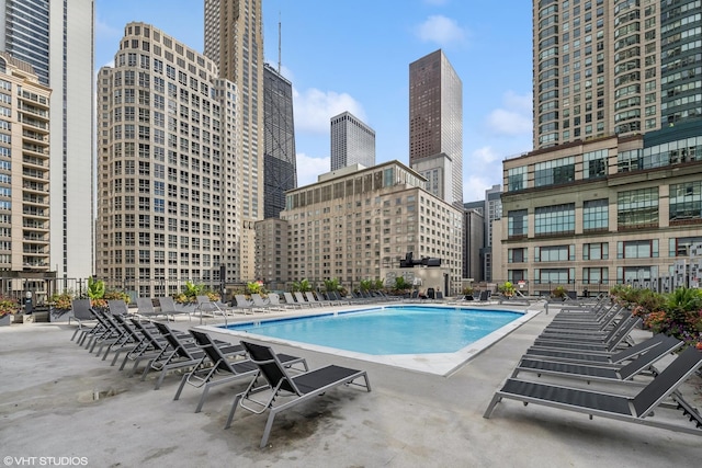 30 E Huron St Unit 3109, Chicago, IL 60611 - community pool featuring a city view and a patio area