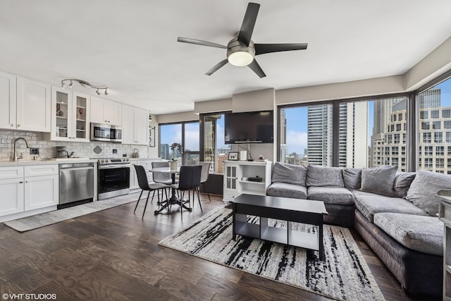 30 E Huron St Unit 3109, Chicago, IL 60611 - living area featuring dark wood finished floors and ceiling fan