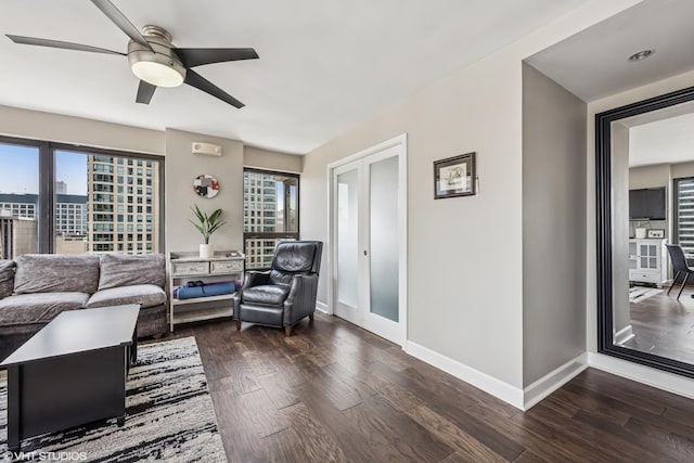 30 E Huron St Unit 3109, Chicago, IL 60611 - living area featuring a ceiling fan, dark wood-style floors, and baseboards