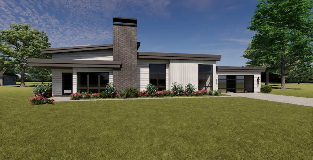 19W744 Bluff Rd, Lemont, IL 60439 - back of house with a lawn, a chimney, driveway, and a garage