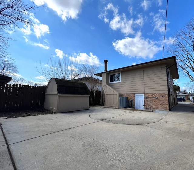 14425 Sanderson Ave, Dolton, IL 60419 - back of house with brick siding and central AC unit