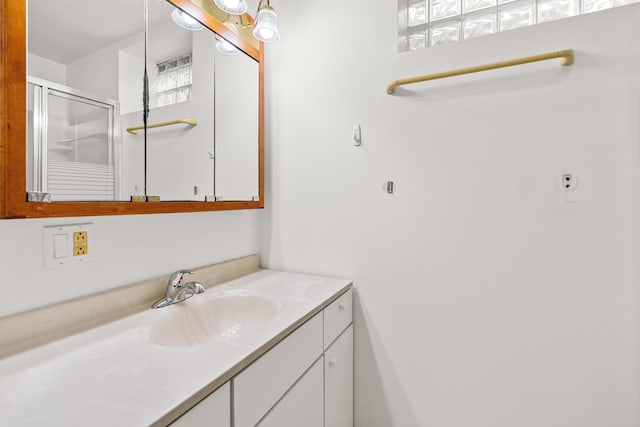 5110 W Lake Shore Dr, Wonder Lake, IL 60097 - bathroom featuring vanity and a shower with shower door